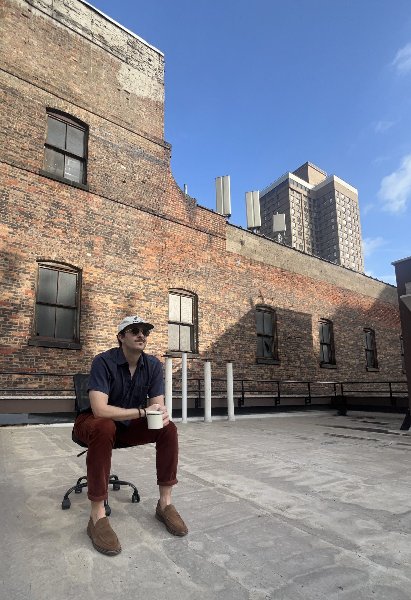 Dylan Webber on a rooftop in New York City