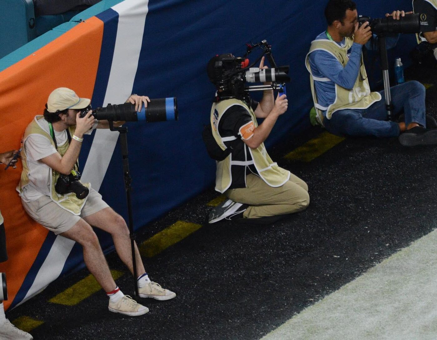 Dylan Webber shooting from the sideline with a long lens